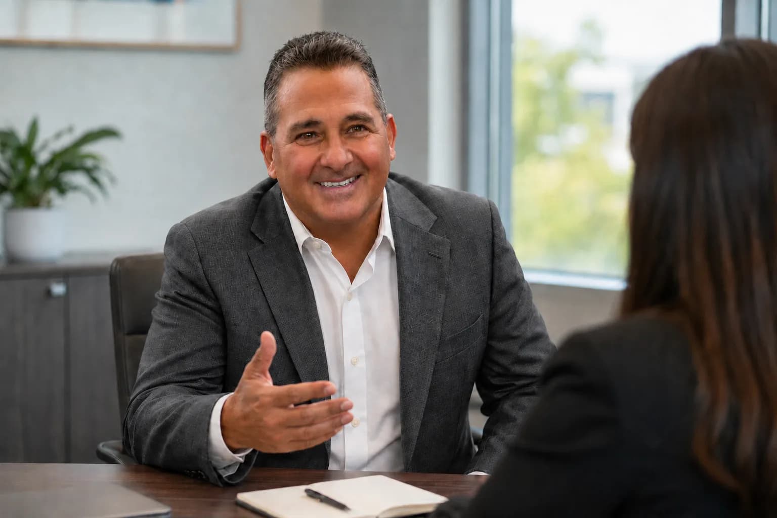 Larry Freedman in a one-to-one conversation with a client